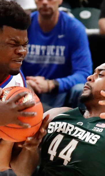 No. 1 Kansas holds off No. 10 Michigan State 92-87
